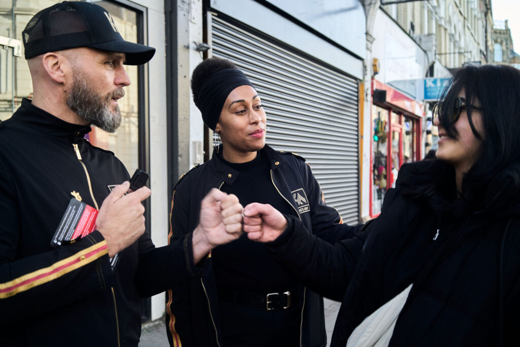 ember king's army man woman street preaching evangelism fist bump human connection and authentic communication